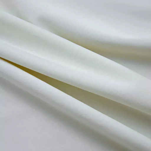 2 db krémszínű bársony sötétítőfüggöny gyűrűkkel 140 x 245 cm